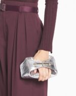 Women’s Haute séquence clutch bag in metallic leather Silver